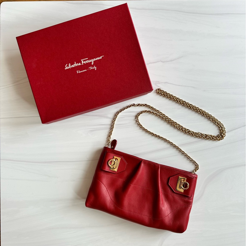 Ferragamo Gancini red leather clutch with chain